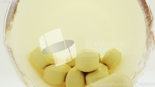 Image of Medical pills with camera motion closeup