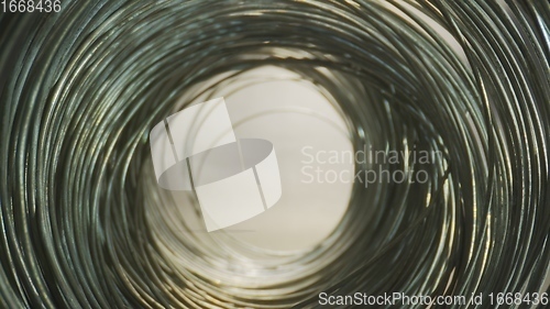 Image of Camera motion in round steel wired tunnel