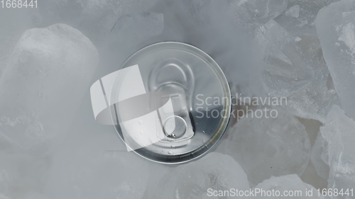 Image of Aluminum Soda Tin Can Rotating in cool Ice motion footage