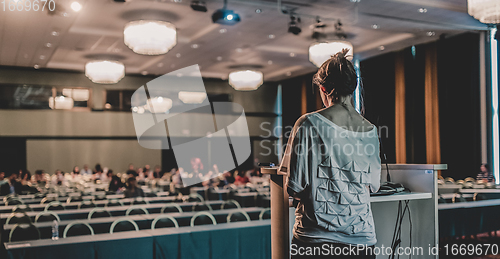 Image of Public speaker giving talk at scientific conference.