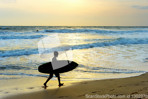 Image of Boy surf beach silhouette