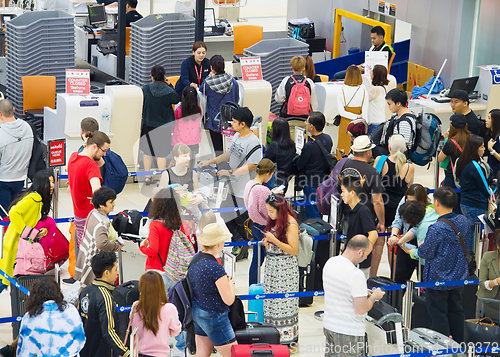 Image of Check-in busy line at airport