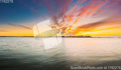 Image of Helsinki, Finland. Suomenlinna Church In Fortress Of Suomenlinna Or Sveaborg And Partially Fortified Island Harakka At Sunrise Sunset Time. Panorama, panoramic view, Helsinki, Finland. Panorama Panor