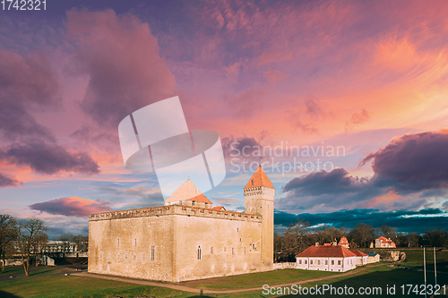 Image of Kuressaare, Saaremaa Island, Estonia. Episcopal Castle In Sunset. Traditional Medieval Architecture, Famous Attraction Landmark. Altered Sky. Traditional Architecture And Famous Place