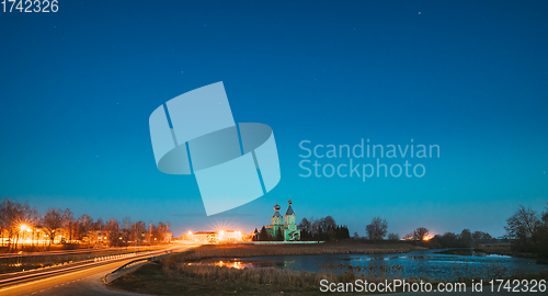 Image of Old Russian Wooden Orthodox Church Of The Holy Trinity Under Night Starry Sky In Village Krupets, Dobrush District, Gomel Region, Belarus. Historical Heritage. Panorama, Panoramic View