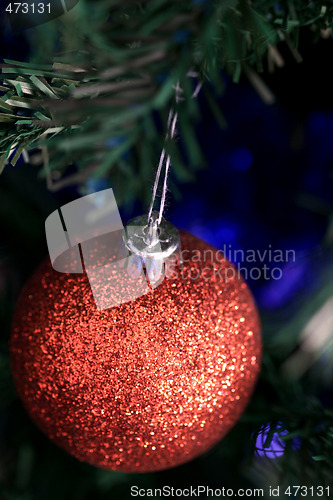 Image of Christmas ornaments on tree.