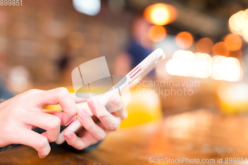 Image of Woman using cellphone