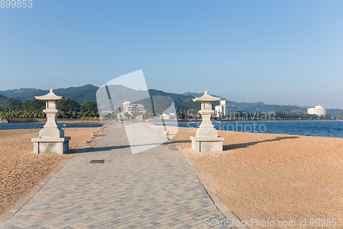 Image of Beach and japanese temple lantern