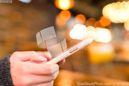 Image of Woman use of mobile phone