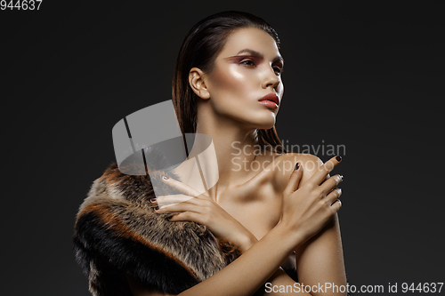 Image of girl in fur scarf