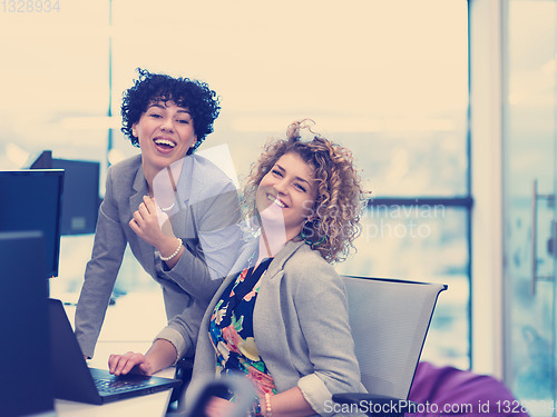 Image of young female software developers at office