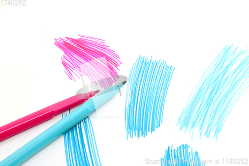 Image of Two felt-tip pens on a white background with abstract drawings