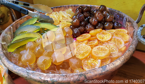 Image of Appetizing candied fruit on a plate