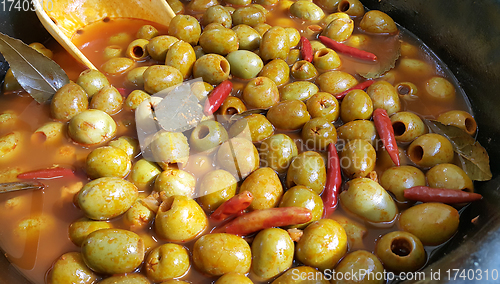 Image of Marinated olives with hot pepper and bay leaf  