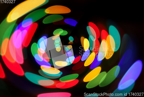 Image of Bright unfocused colorful lights in night