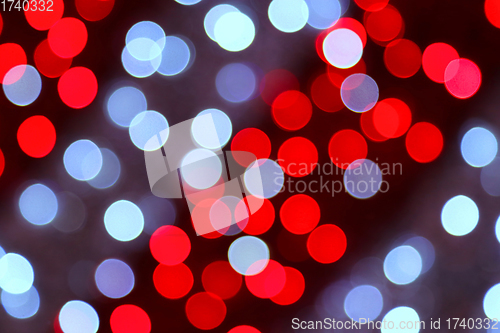 Image of Unfocused bright holiday lights background