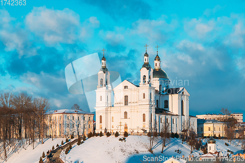 Image of Vitebsk, Belarus. Famous Landmark Is Assumption Cathedral Church In Upper Town On Uspensky Mount Hill And Pushkin Bridge In Sunny Winter Day