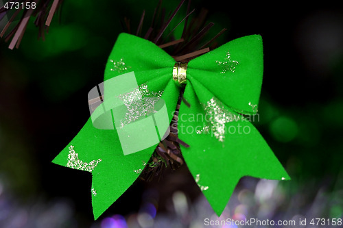 Image of Christmas ornaments on tree.