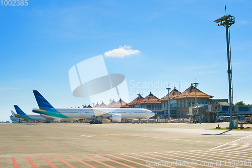 Image of Bali airport with many airplanes