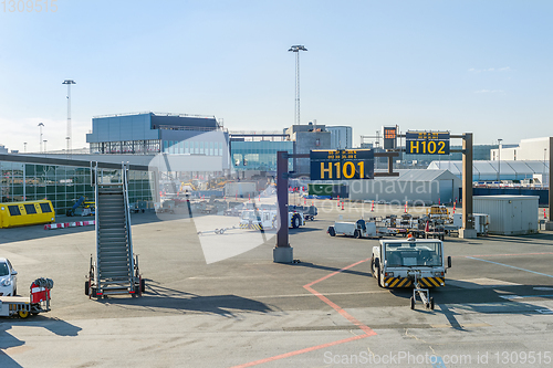 Image of Luggage carrier cars and gangway 