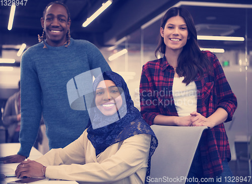 Image of multiethnics team of software developers working together