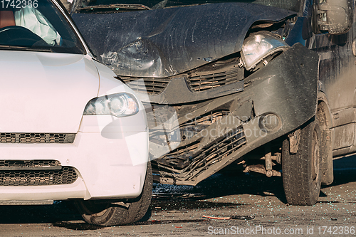 Image of Collision Of Two Cars. Crashed Minibus And Luxury Crossover SUV Cars In City Street. Car Wreck, Accident. Collision Of Two Cars. Crashed Minibus And Luxury Crossover SUV Cars In City Street. Car Wrec