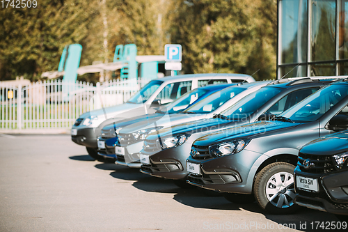 Image of Lada Vesta, Granta Cars Parked In Row Near Dealership