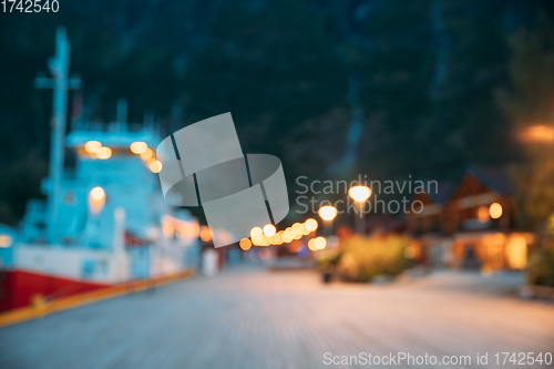 Image of Flam, Norway. Touristic Ship Boat Moored Near Berth In Sognefjord Port. Summer Evening. Abstract Boke Bokeh Background. Design Backdrop