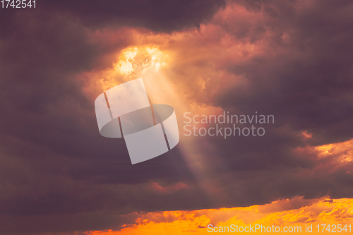 Image of Sunshine In Sunrise Bright Dramatic Sky. Sun Ray Through Dark Rainy Clouds. Scenic Colorful Sky At Dawn. Sunset Sky Natural Abstract Background