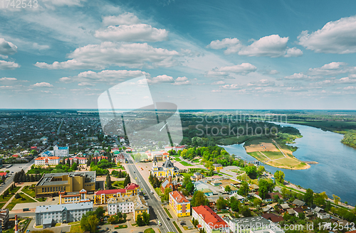 Image of Rechytsa, Belarus. Aerial View Of Residential Houses And Famous Landmarks Of Town: Holy Assumption Cathedral And Holy Trinity Church In Sunny Summer Day.