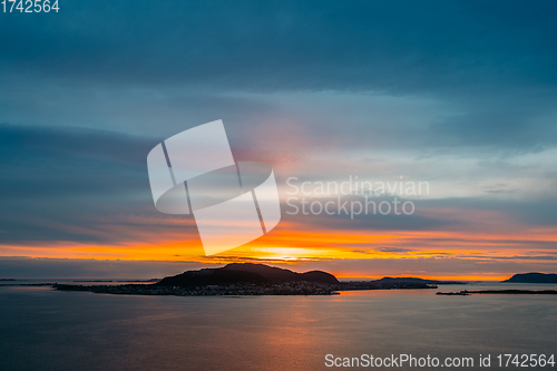 Image of Alesund, Norway. Amazing Natural Bright Dramatic Sky Above Alesund Valderoya And Islands In Sunset Time. Colorful Sky Background. Beauty In Norwegian Nature