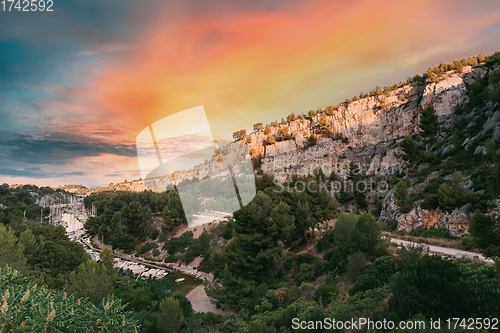 Image of Cassis, Calanques, France. French Riviera. Beautiful Nature Of Cote De Azur On The Azure Coast Of France. Calanques - A Deep Bay Surrounded By High Cliffs. Altered Sunset Sky