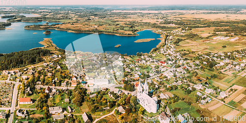Image of Slobodka, Braslaw District, Vitebsk Voblast, Belarus. Aerial View Of Potsekh Lake Near Slobodka Village. Church of Divine Providence. Panorama
