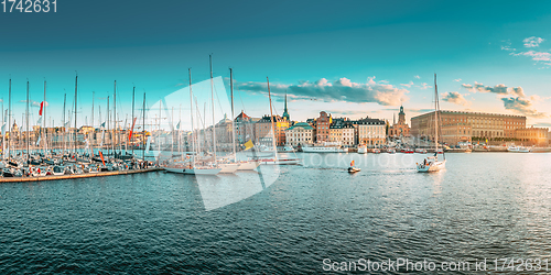 Image of Stockholm, Sweden. Scenic Famous Panoramic View Of Embankment In Old Town Of Stockholm In Sunset Lights. Jetty With Many Moored Yachts. Popular Destination Scenic Place. Panorama