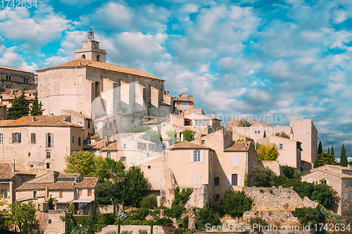 Image of Gordes, Provence, France. Beautiful Scenic View Of Medieval Hilltop Village Of Gordes. Sunny Summer Sky. Famous Landmark.