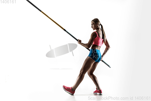 Image of Female pole vaulter training on white studio background
