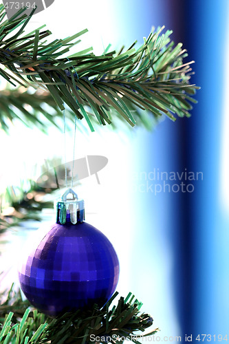 Image of Christmas ornaments on tree.