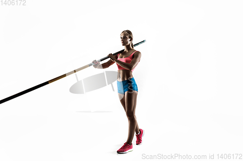 Image of Female pole vaulter training on white studio background