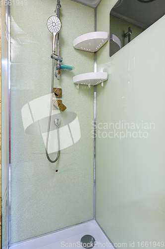 Image of Cracked rear window of the shower stall