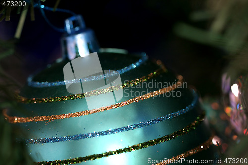 Image of Christmas ornaments on tree.