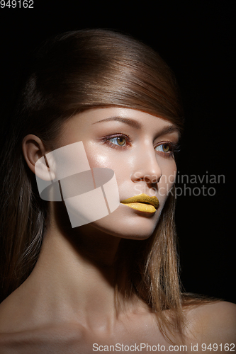 Image of beautiful girl with yellow lips