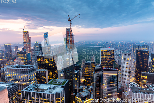 Image of New York City skyline with urban skyscrapers at sunset, USA.