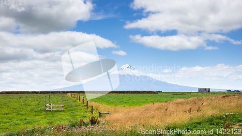 Image of volcano Taranaki covered in clouds, New Zealand 