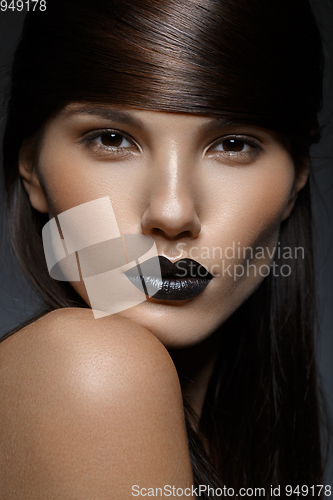 Image of beautiful girl with black lips