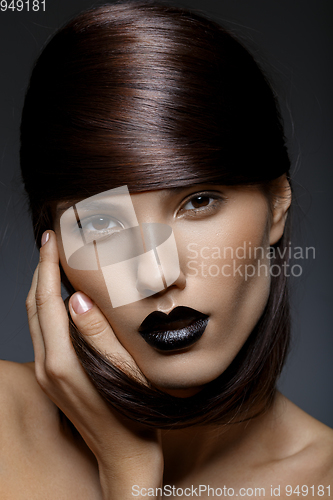 Image of beautiful girl with black lips