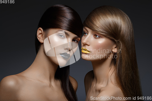 Image of twp beautiful girls with glowing skin