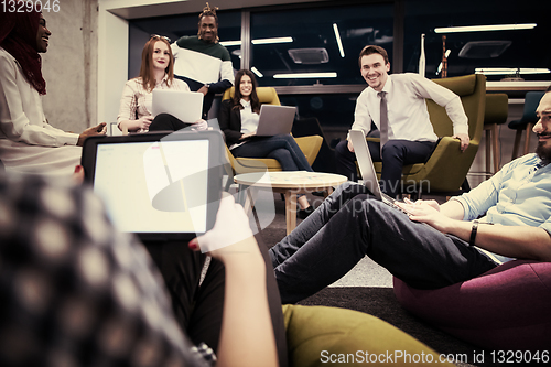 Image of Multiethnic startup business team having meeting