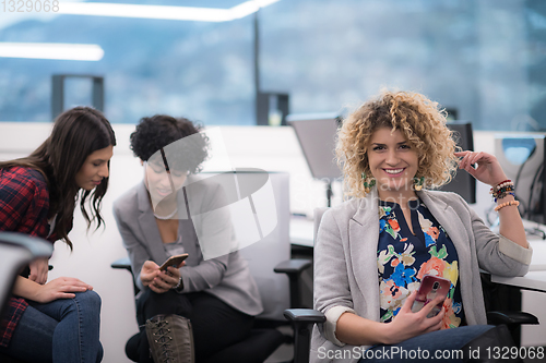 Image of Portrait of young successful female software developer