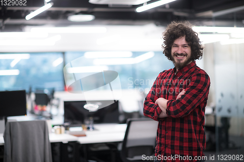 Image of Portrait of smiling male software developer