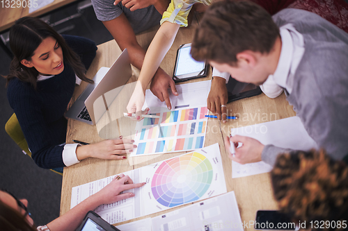 Image of Multiethnic startup business team having meeting